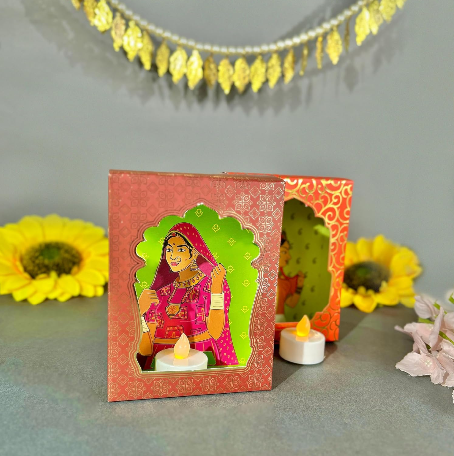 Good Luck Gift Hamper | Gold Polished Ganpati Idol with Metal Urli, Candles, Organic Dhoop, Decorative Jharokas & Snacks | Diwali, Bhaidooj, Housewarming Gift Set